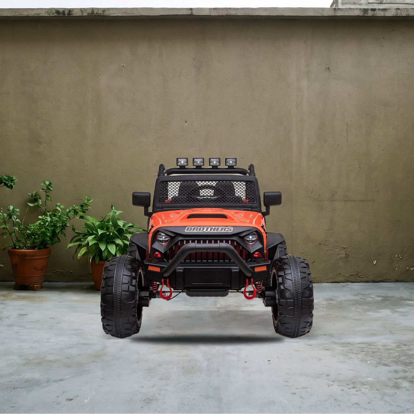Camioneta electrica montable para ninos en un patio